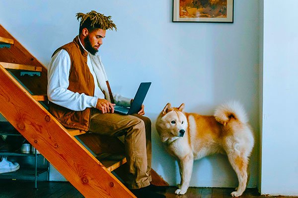 Man and his dog on the stairs